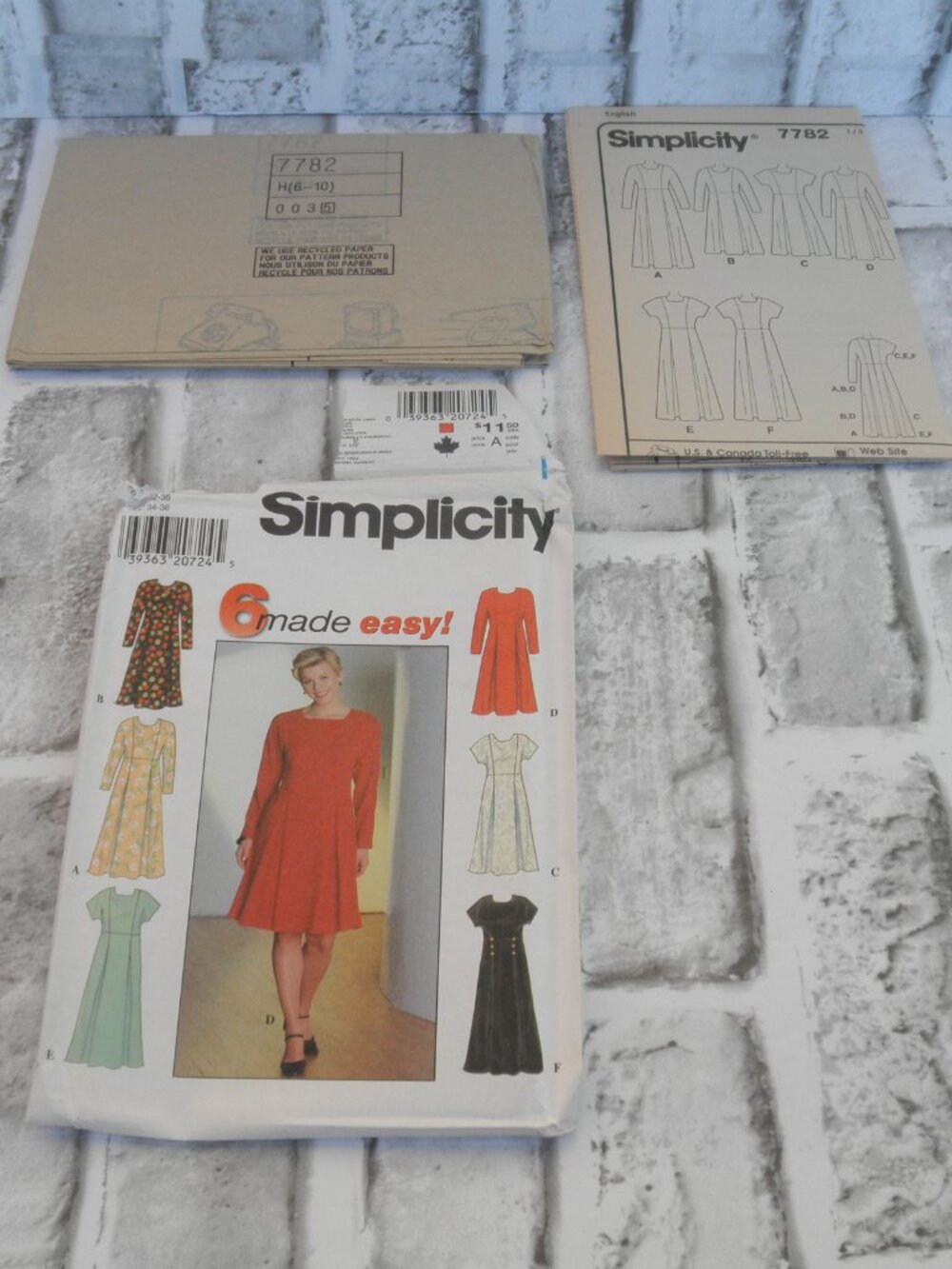 #7782, SIMPLICITY UNCUT SEWING PATTERN DRESS (SIZE 6-8-10) (11 PIECES)